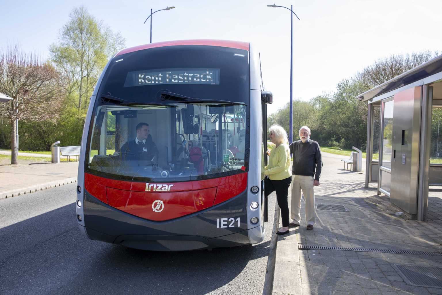 Passengers getting on a new Fastrack bus
